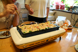 prodding and turning while cooking