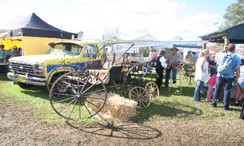 Old Carriage and a Wheel Maker