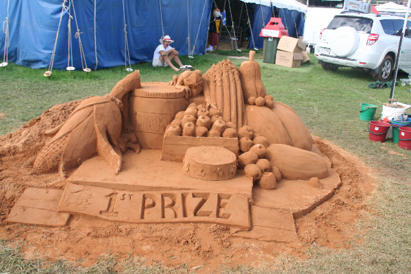 Sand Sculpture First Prize. WOW did the artist have intuition or what?