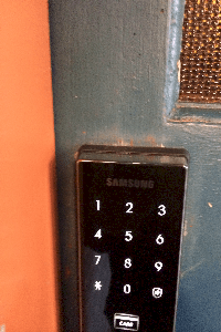 A full panel display, insert the four digit password followed by the pound sign and the door opens! AWESOME! i want one of these!!! :)