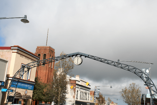 Clock bridge over street