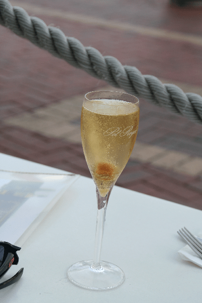 Champagne with a ginger sugar cube 