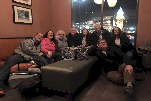 From left to right Baby Joshua, Daddy Larry, Mommy Sierra Lee, Nanny Grandmother Carol Lee, Popi Grandfather Lenny, Susan Great Aunt, Donnie Great Uncle, Susan Great Aunt and sitting on the floor, brother Richard Great Uncle and birthday boy